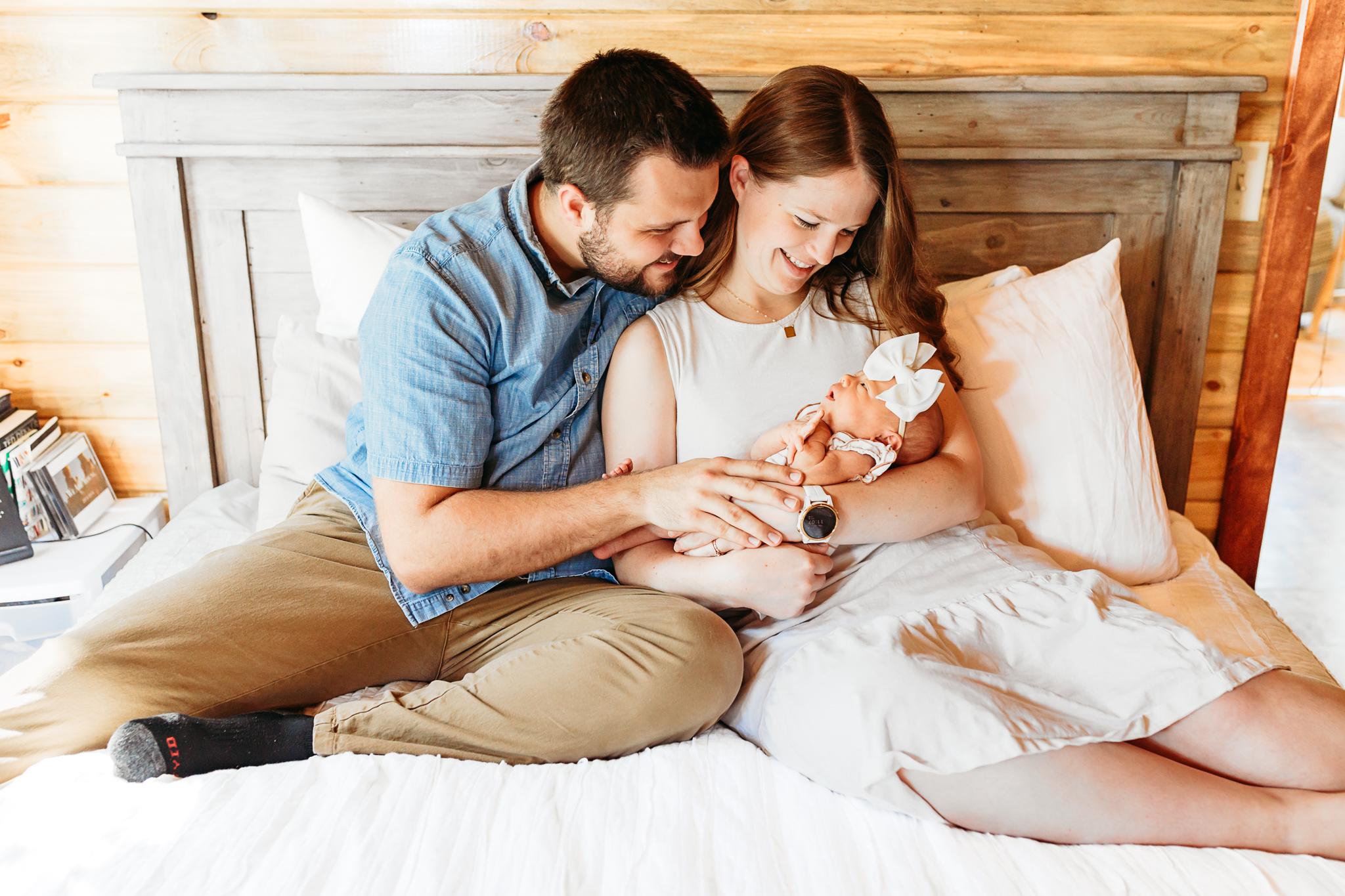 A couple with newborn during newborn photo session in OKC.
