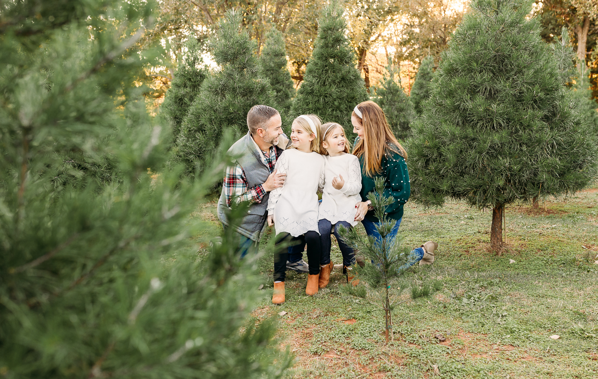 family during Christmas Tree Farm Mini Session in Norman, OK.