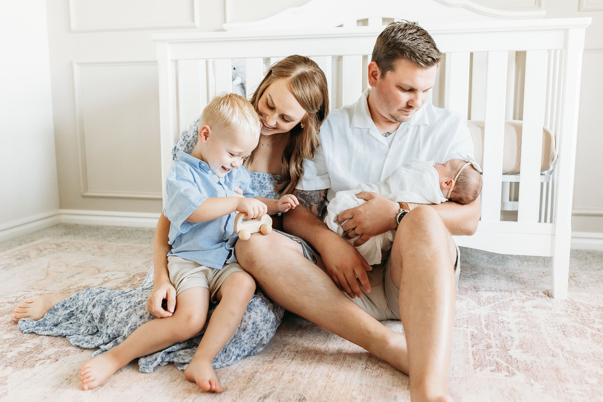 family of four in nursery in OKC.