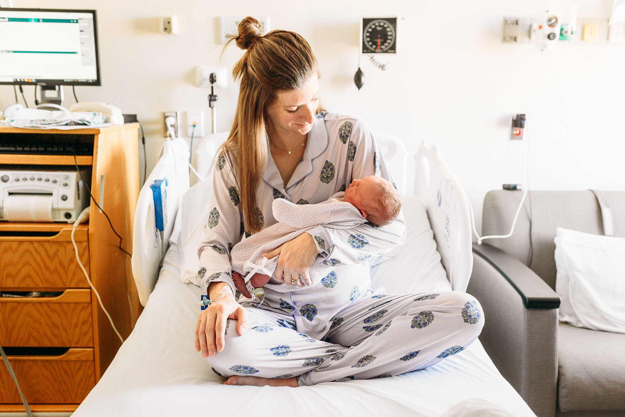 Mom with newborn at hospital.