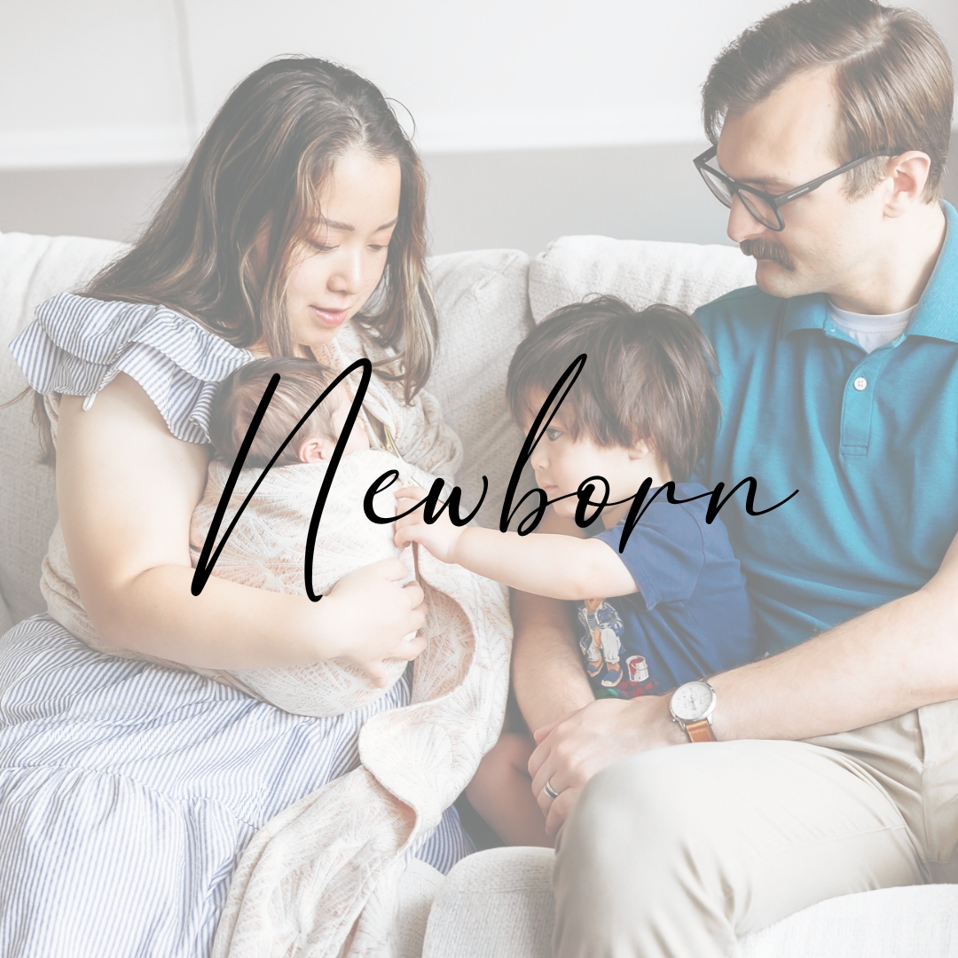 family of 4 during newborn photo session with overlay saying newborn on it.