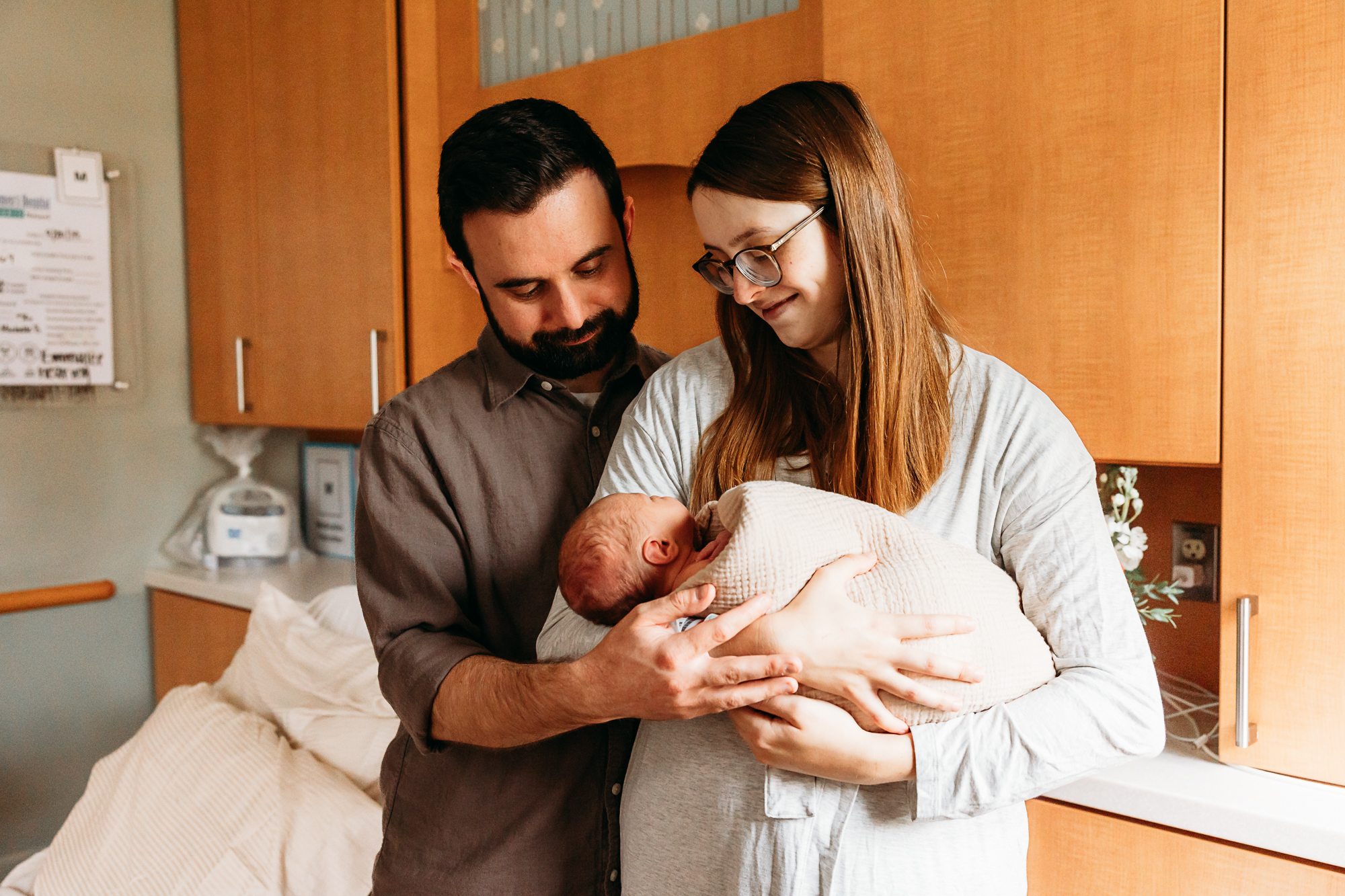 Family of 5 during newborn photo session in OKC.