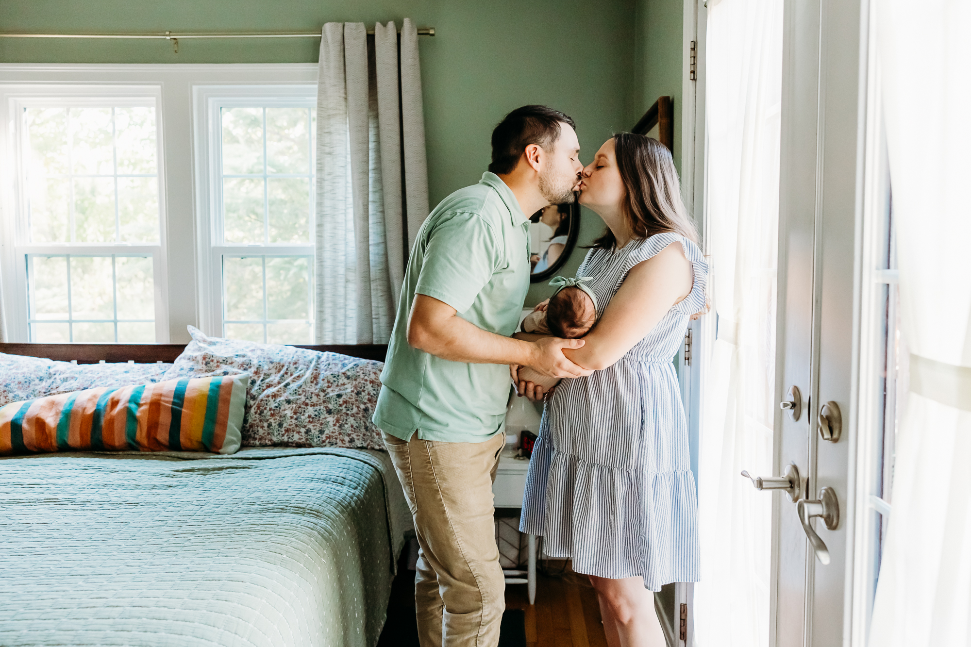 Mom snuggles baby during Oklahoma City newborn session.