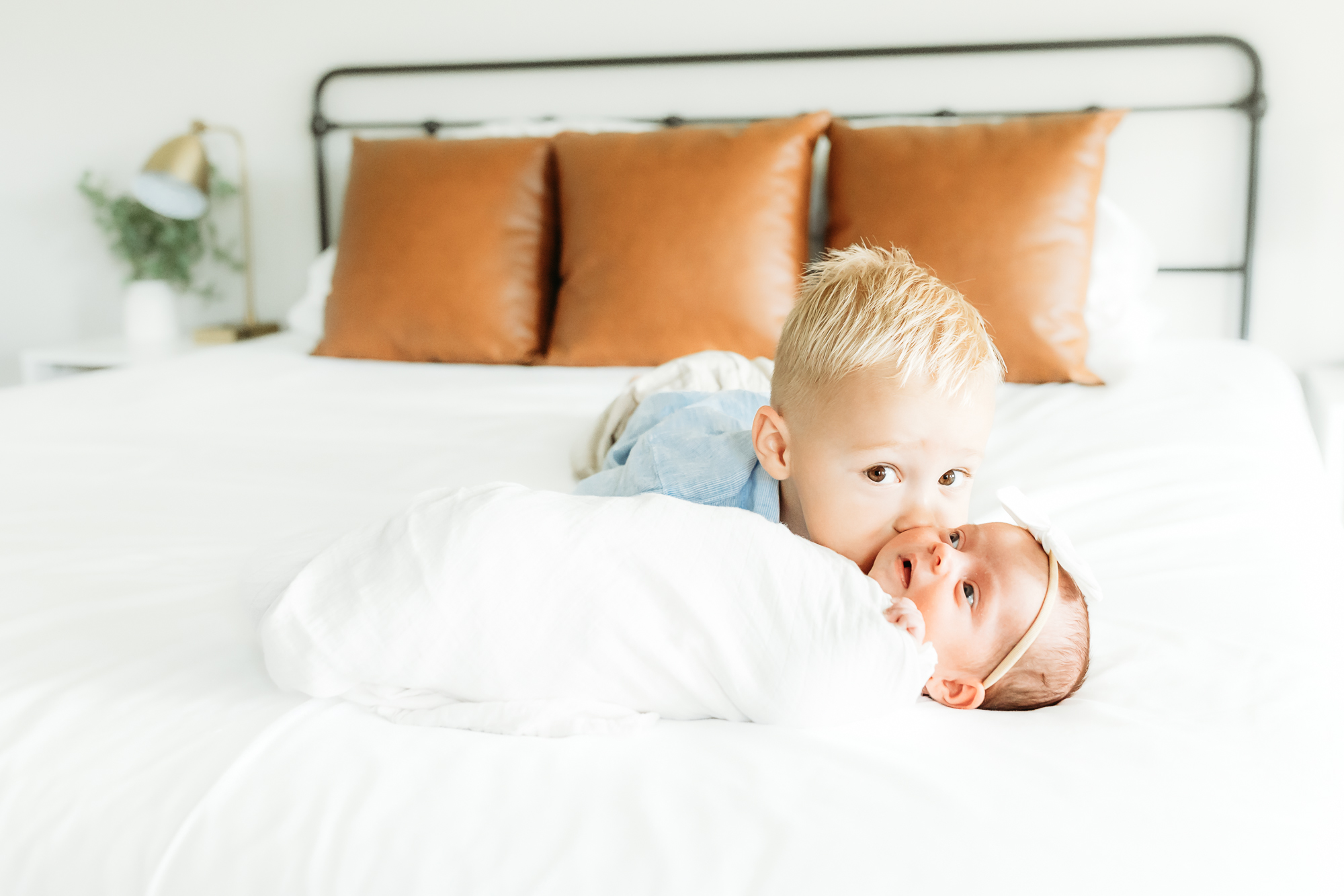 Mom snuggles baby during Oklahoma City newborn session.